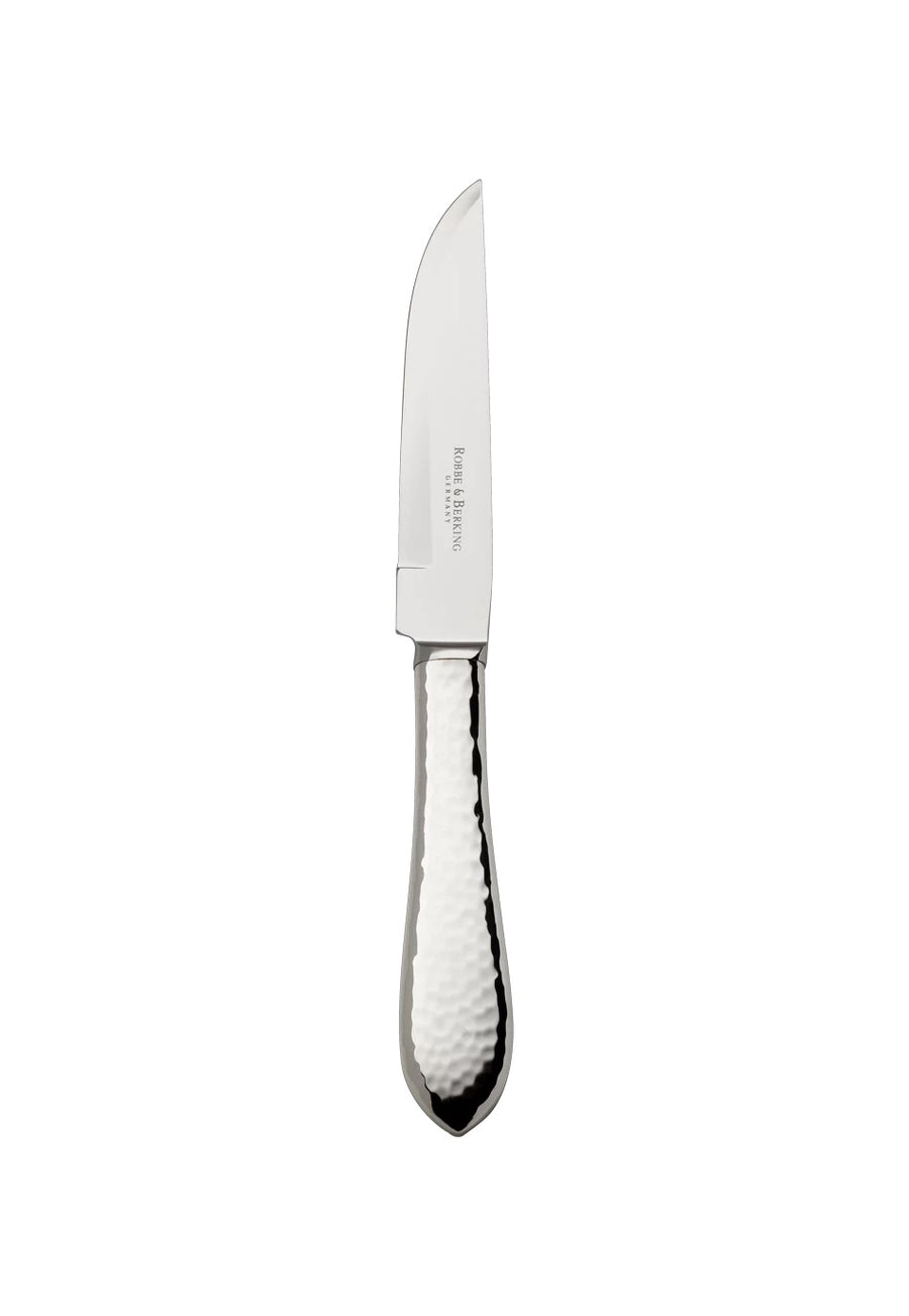 Ein kleines Messer mit glänzender, gebogener Klinge und strukturiertem, weißem Griff. Auf der Klinge ist „Robbe & Berking Martelé 150 Steakmesser“ eingraviert. Das Gesamtdesign ist schlicht und funktional. Der Hintergrund ist schlicht weiß.