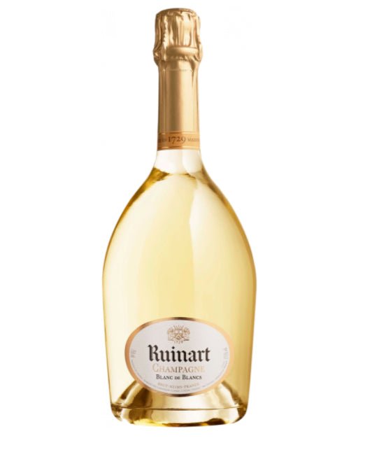 Eine Flasche Ruinart Champagne Blanc de Blancs mit einem klaren Goldton und deutlich sichtbarem Etikett.